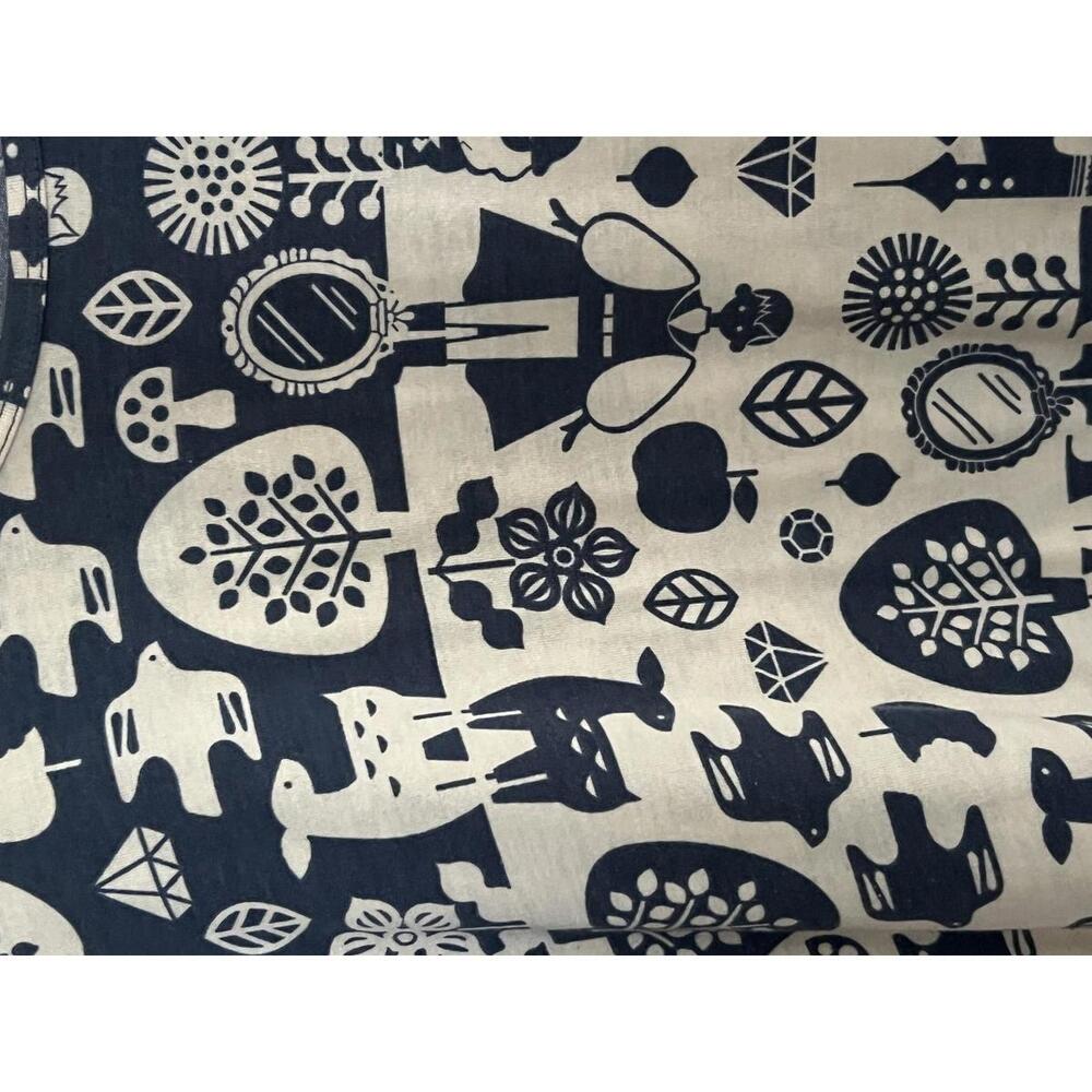 LuLaRoe Black and Cream Disney Patterned Tunic Top - Picture 3 of 5